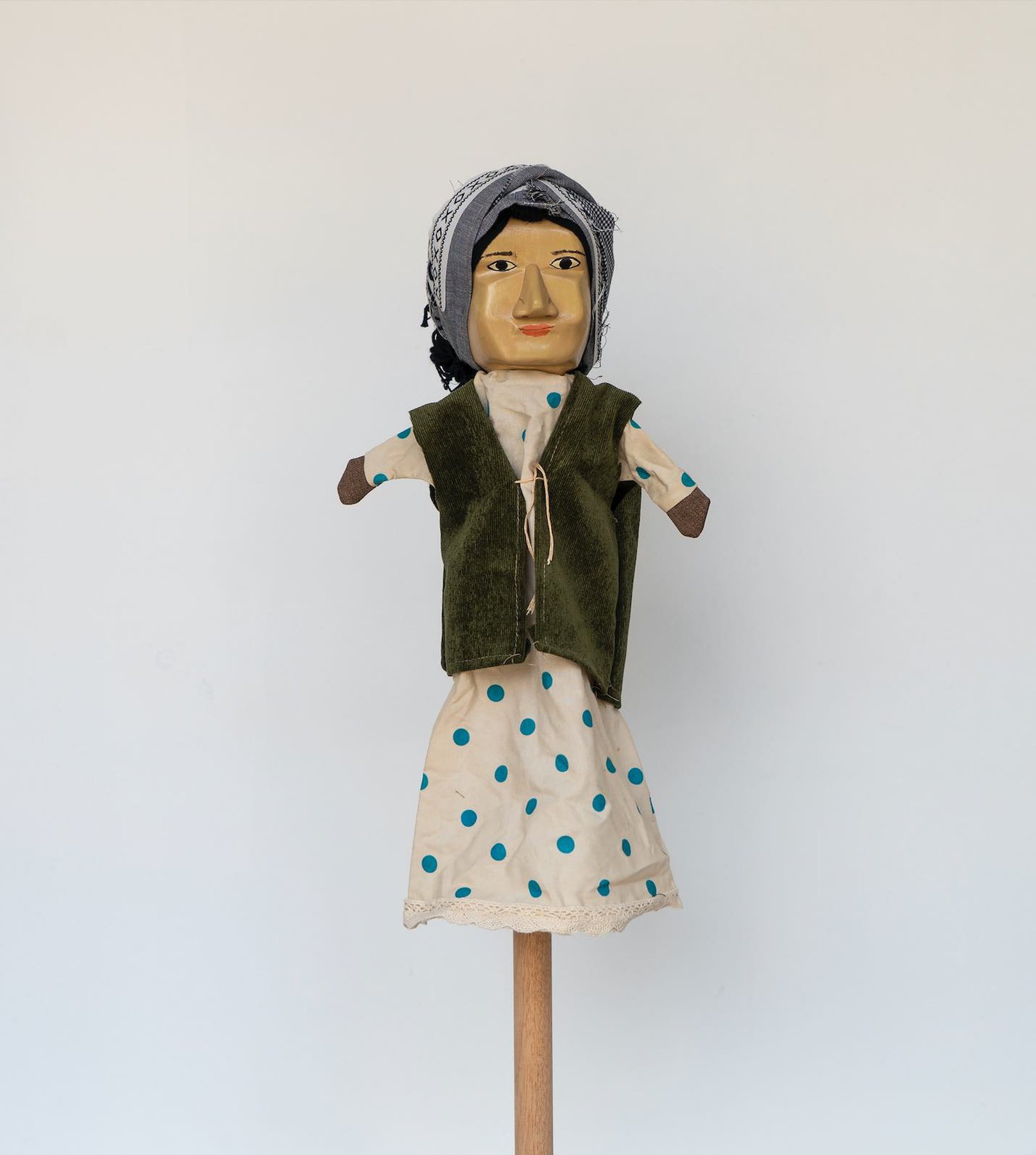 Daniela Ortiz, The Brightness of Greedy Europe, 2022, wood hand-carved, sewn, knitted and embroidered costumes (25 cm) puppet - Houria Bouteldja