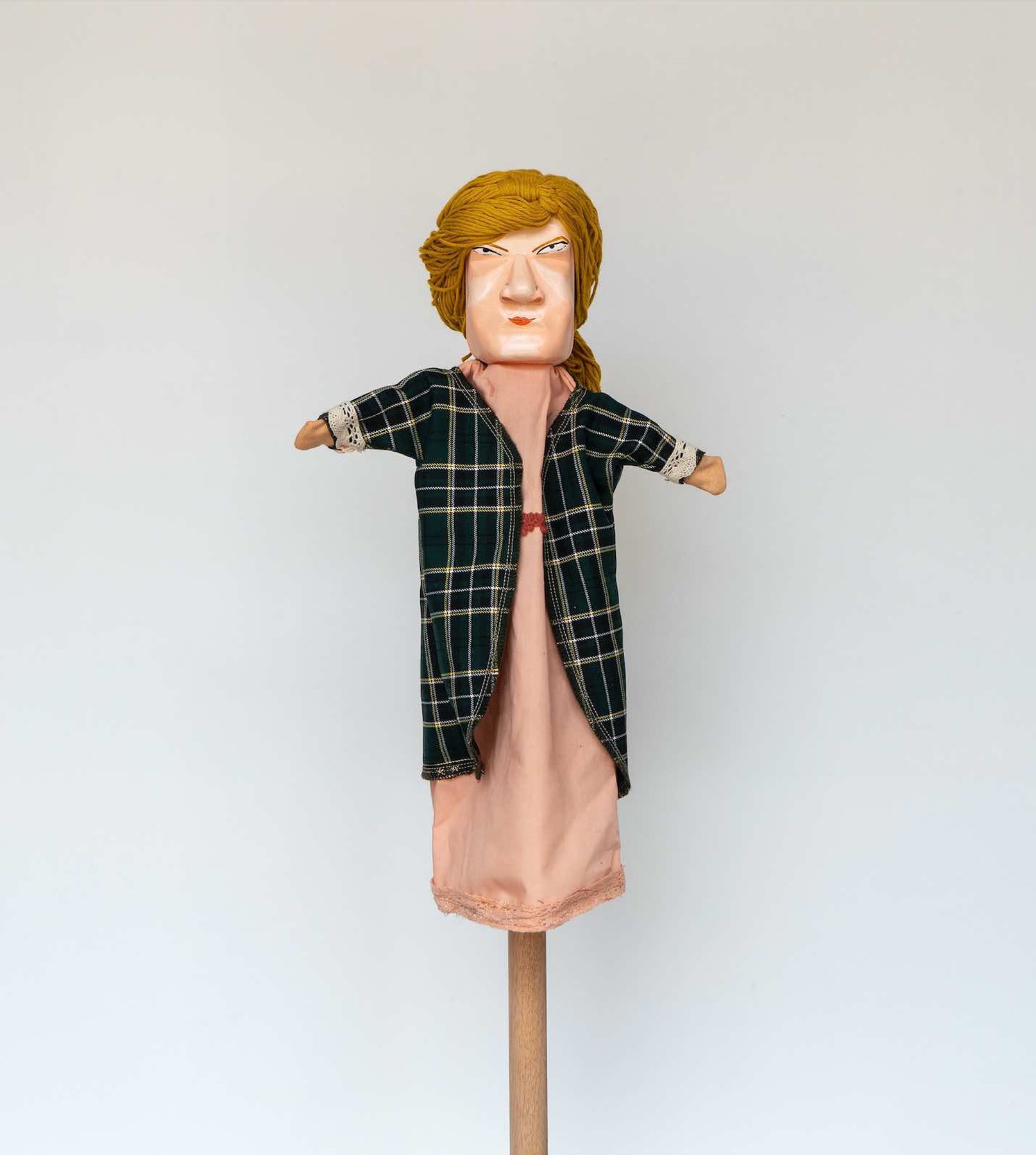 Daniela Ortiz, The Brightness of Greedy Europe, 2022, wood hand-carved, sewn, knitted and embroidered costumes (25 cm) puppet - Social worker